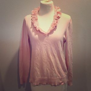 Baby pink V neck pull over sweater with ruffle.